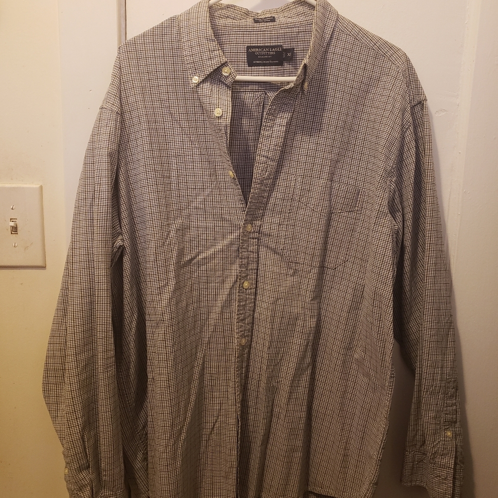 Long-sleeved button down shirt.